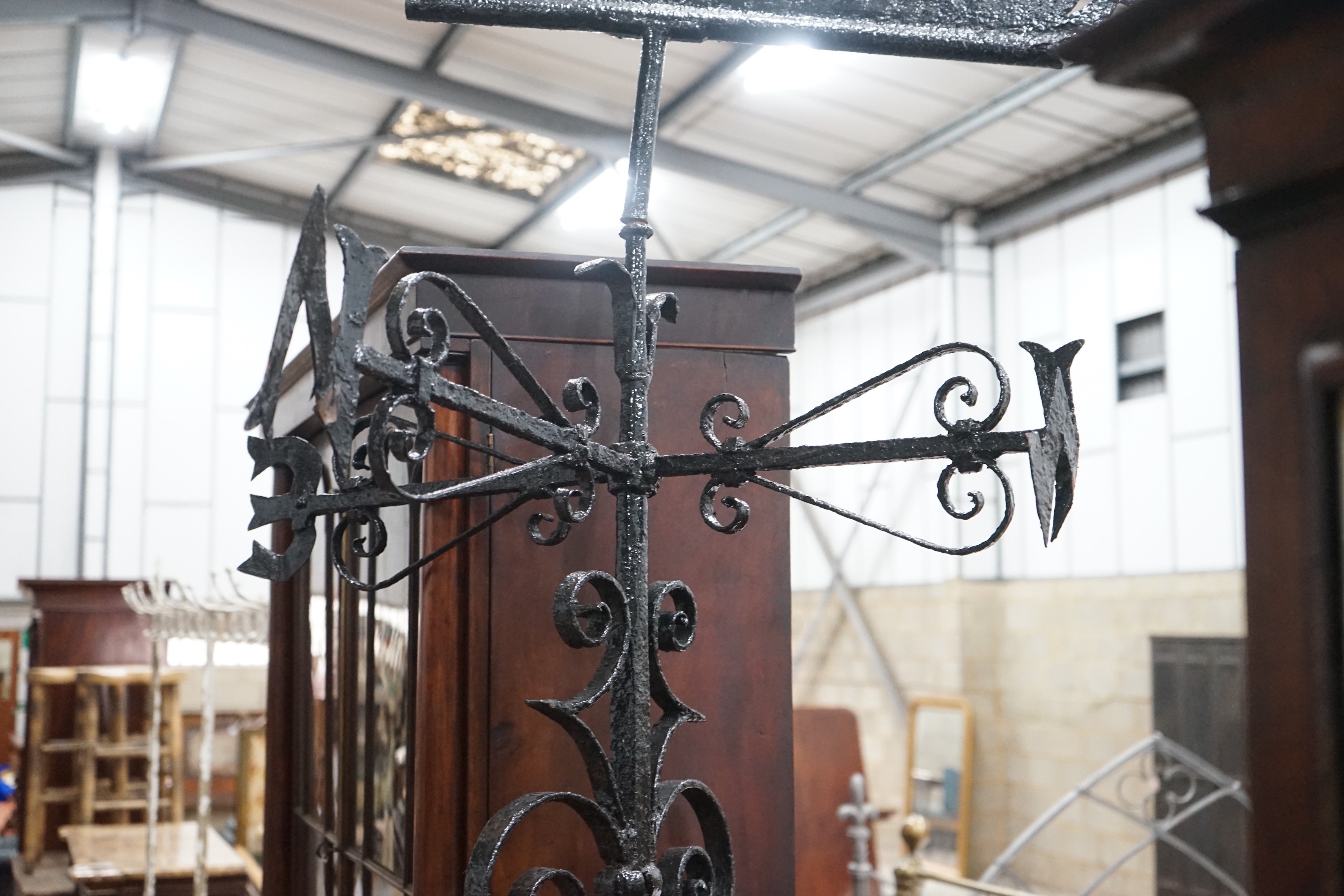 A large wrought iron weather vane, height 270cm